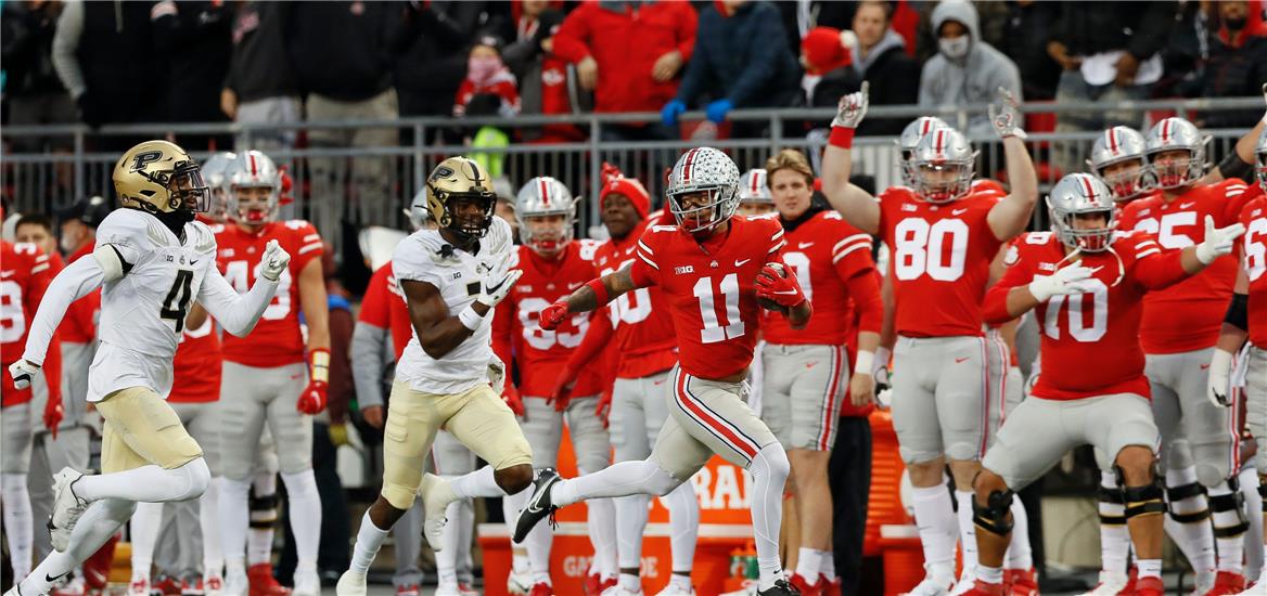 Ohio State Buckeyes wide receiver Jaxon Smith-Njigba (11) races up the sideline ahead of Purdue Boilermakers cornerback Jamari Brown (7) and safety Marvin Grant (4) during the first quarter of the NCAA football game at Ohio Stadium in Columbus on Saturday, Nov. 13, 2021. Adam Cairns/Columbus Dispatch / USA TODAY NETWORK

                    