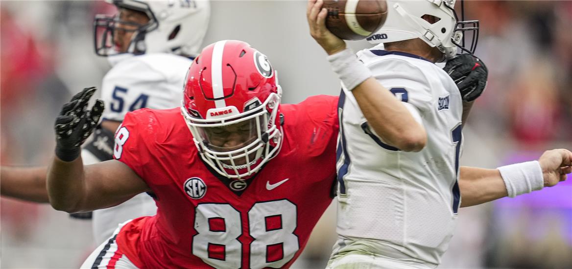 Georgia Bulldogs defensive lineman Jalen Carter (88) hits Samford Bulldogs quarterback Michael Hiers (10) during the first half at Sanford Stadium.  Dale Zanine-USA TODAY Sports

                    