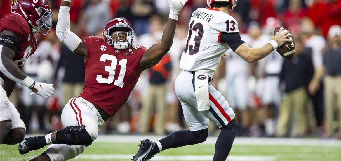 Jan 10, 2022; Indianapolis, IN, USA; Alabama Crimson Tide linebacker Will Anderson Jr. (31) defends against Georgia Bulldogs quarterback Stetson Bennett (13) in the 2022 CFP college football national championship game at Lucas Oil Stadium. Mark J. Rebilas-USA TODAY Sports