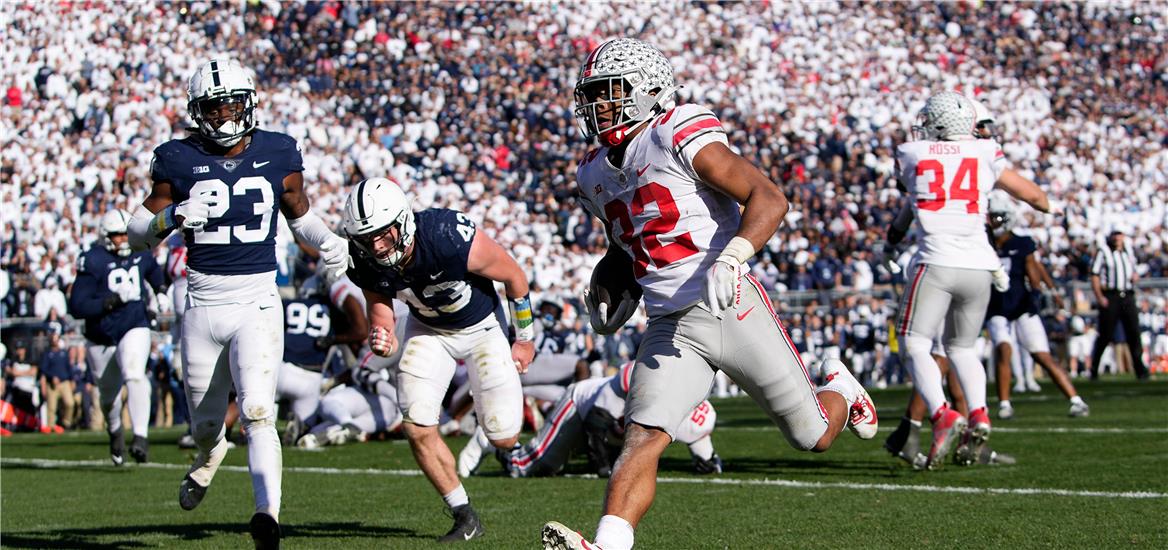 
Ohio State Buckeyes running back TreVeyon Henderson (32) runs for a 7-yard touchdown past Penn State Nittany Lions linebacker Tyler Elsdon (43) and linebacker Curtis Jacobs (23) during the fourth quarter of the NCAA Division I football game at Beaver Stadium.  Adam Cairns-The Columbus Dispatch Ncaa Football Ohio State Buckeyes At Penn State Nittany Lions
                    