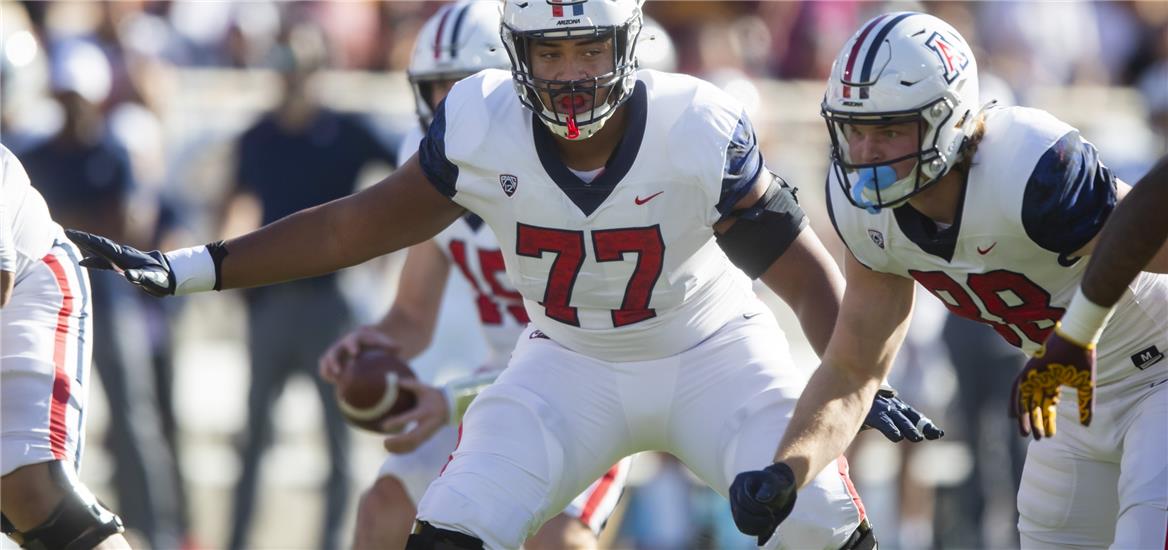 Arizona Wildcats offensive lineman Jordan Morgan (77) against the Arizona State Sun Devils during the Territorial Cup at Sun Devil Stadium. Mark J. Rebilas-USA TODAY Sports

                    